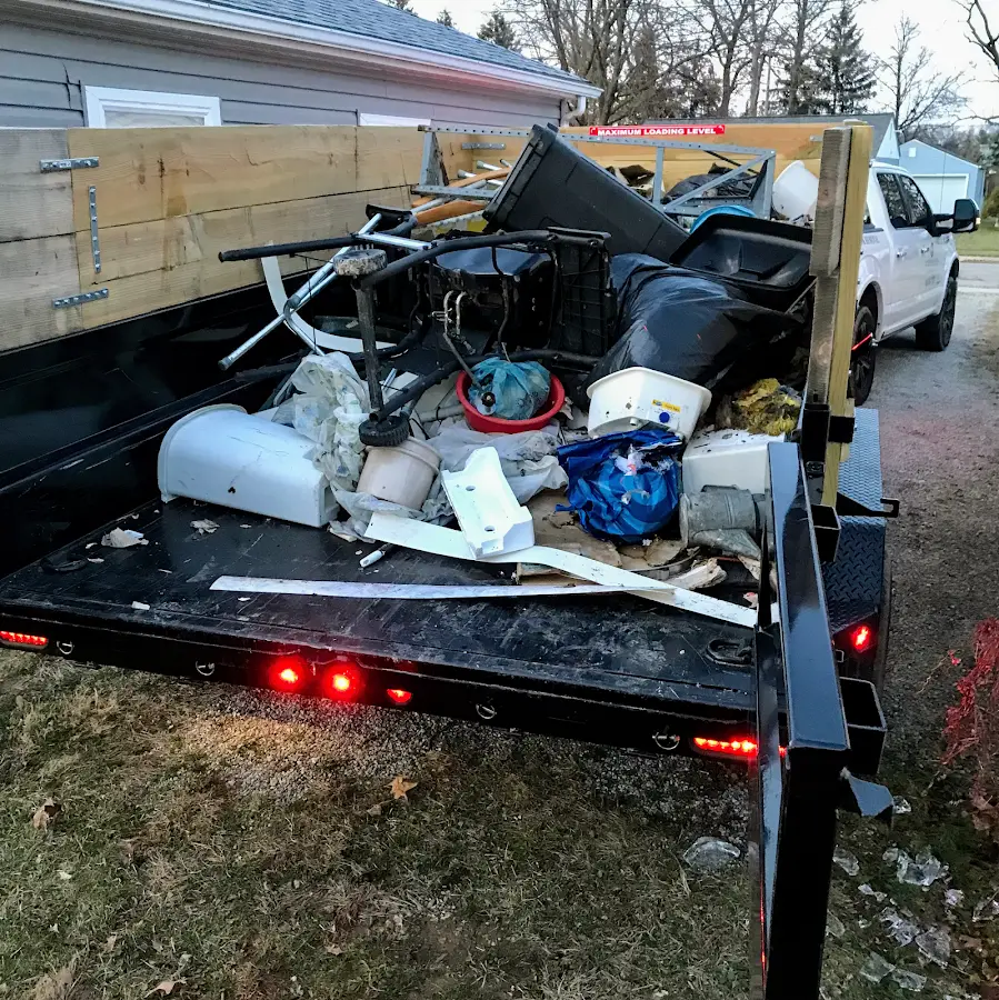 Roll-off dumpster delivered to a residential driveway in Clarence